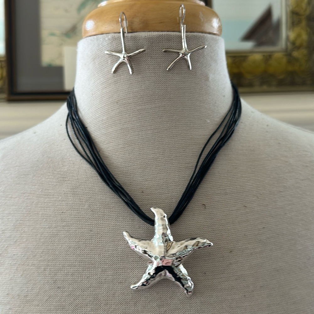 Never worn darling Silver Starfish necklace and earrings set